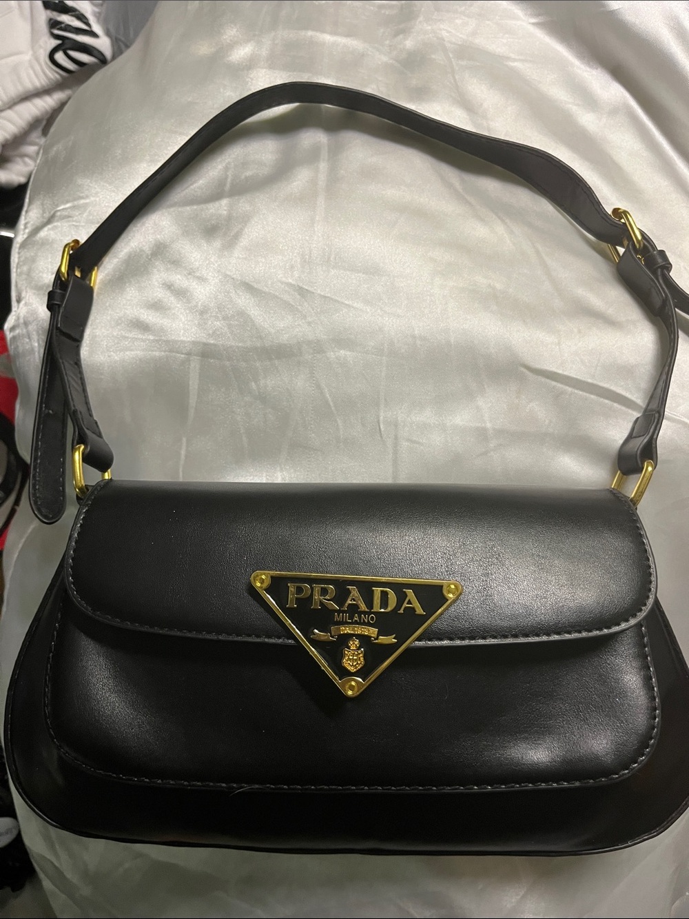 Prada Black Leather Shoulder Bag with Gold Triangle Plaque